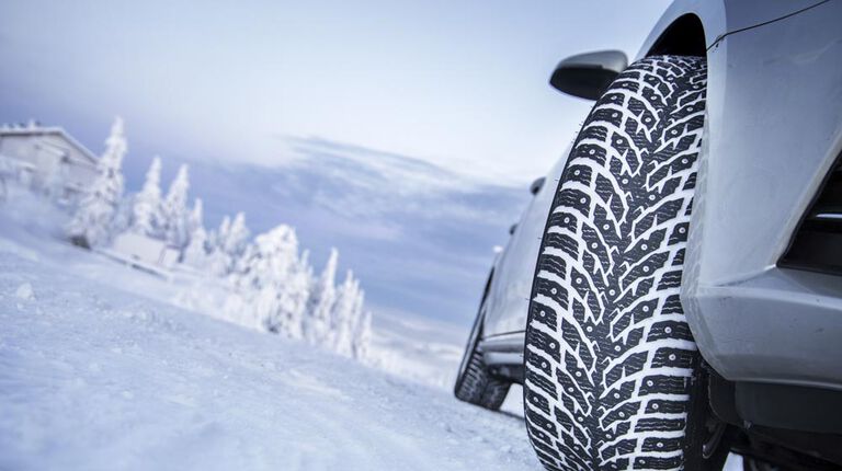 winter road with winter studded tires