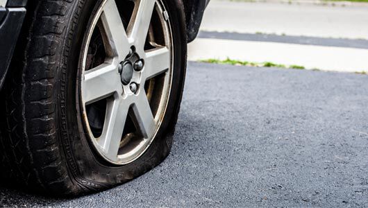 Can I drive on a flat tire?