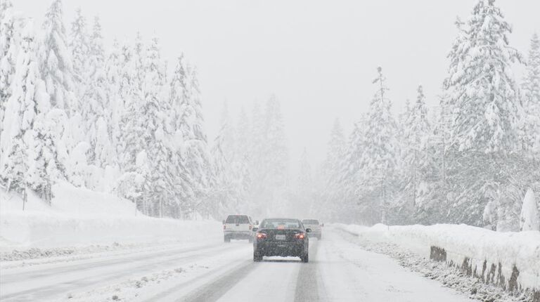 All-season tires (3-seasons) tires on car on winter road