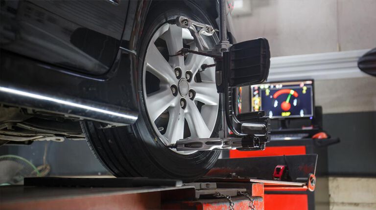 Car on alignment machine