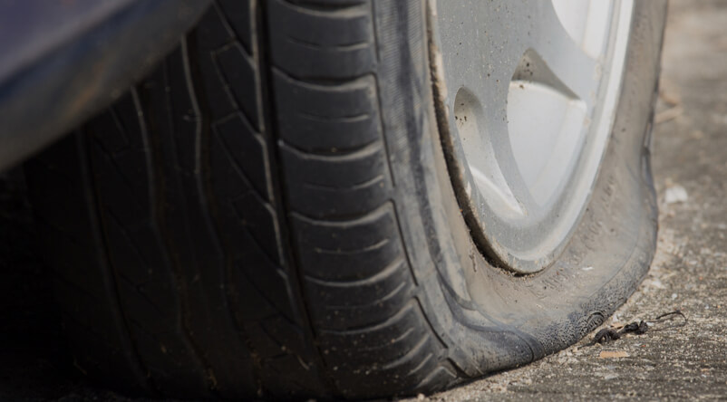 Vehicle with a flat tire