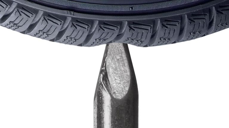 Tire with nail in it