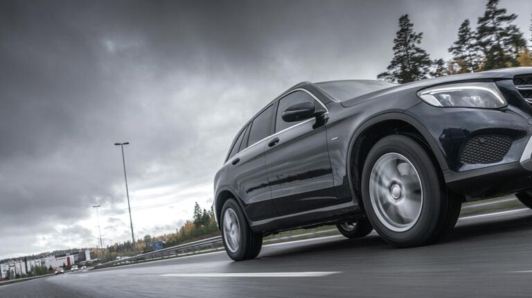 Vehicle with all-season tires on road